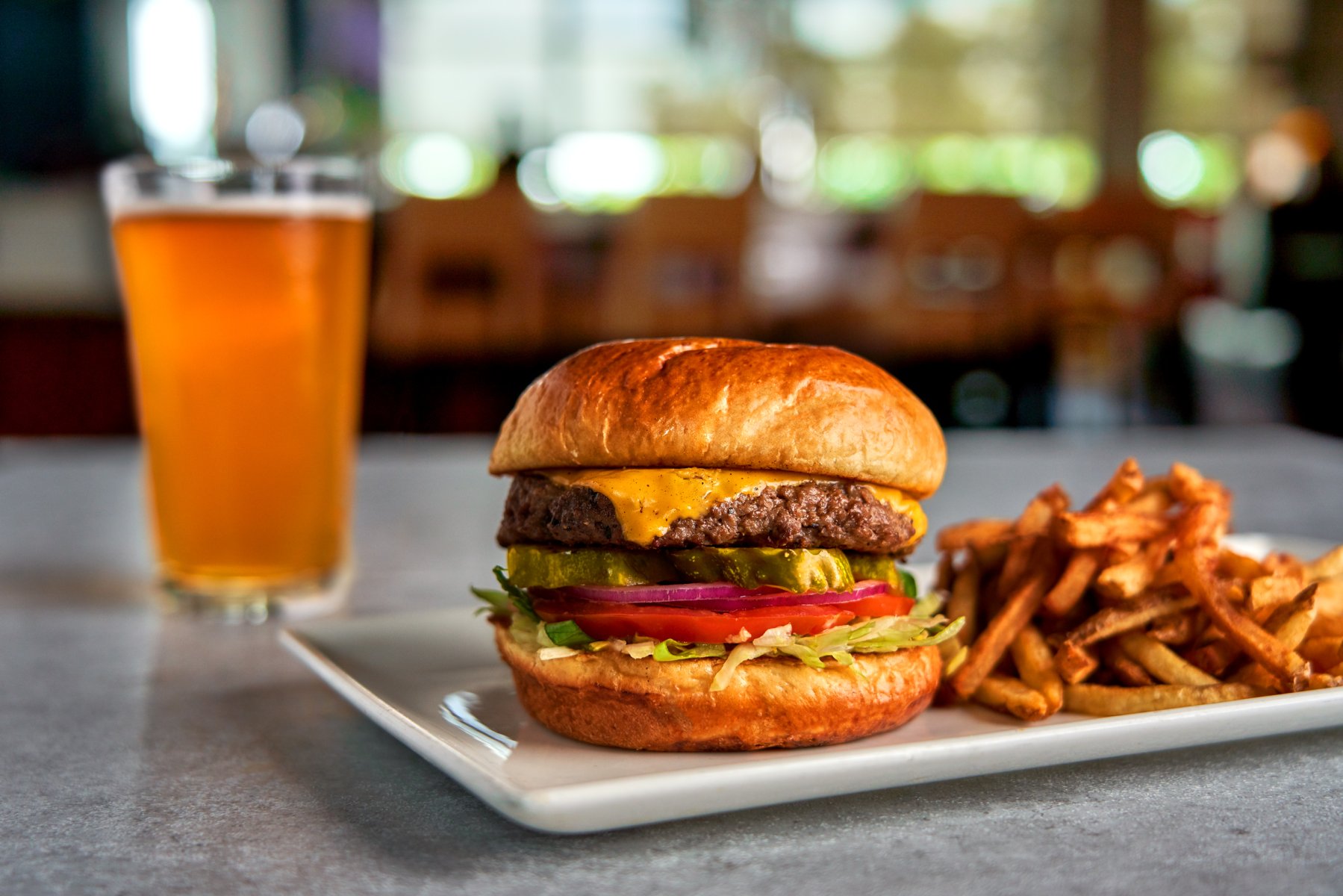 burger, fries, and beer
